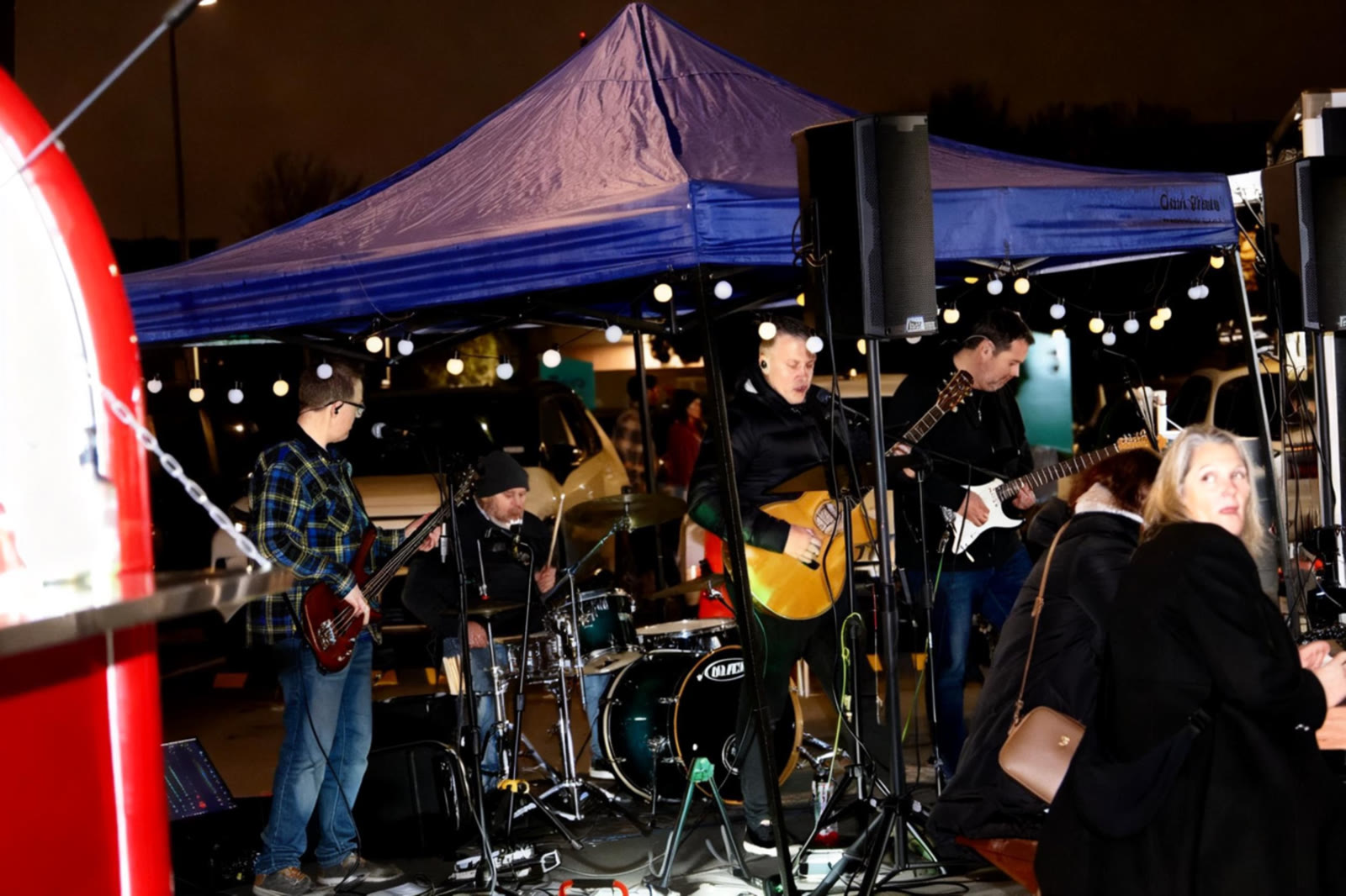 Zero Hour playing under the gazebo at the Arts Centre night market