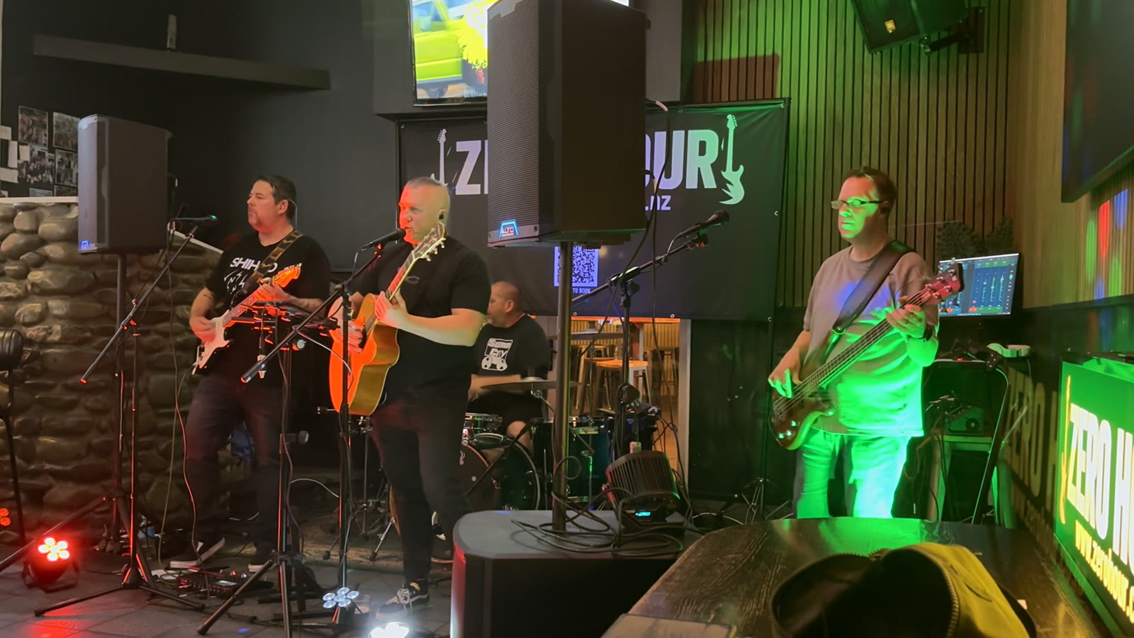 Zero Hour playing at The Rock with green stage lighting